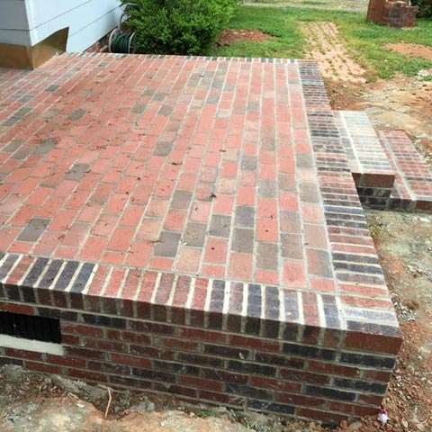 Siding by the Best - brick porch